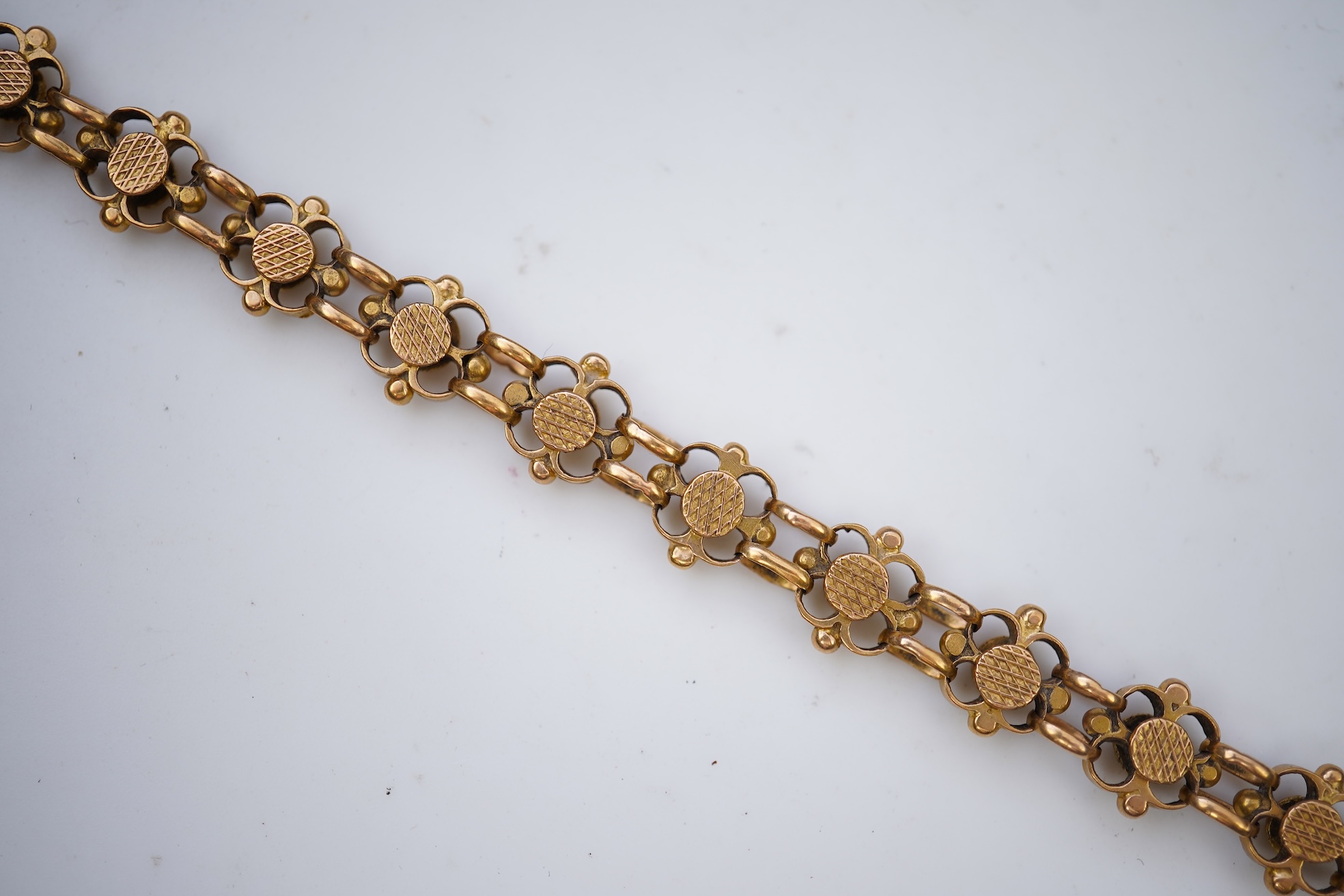 A gold bracelet, circa 1990